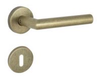 Kljuka Metro, rozeta okrogla, ključ, inox surova medenina 